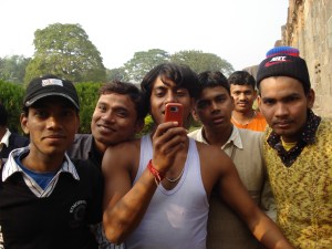 Indian men, capturing the "sights" at Adina Mosque